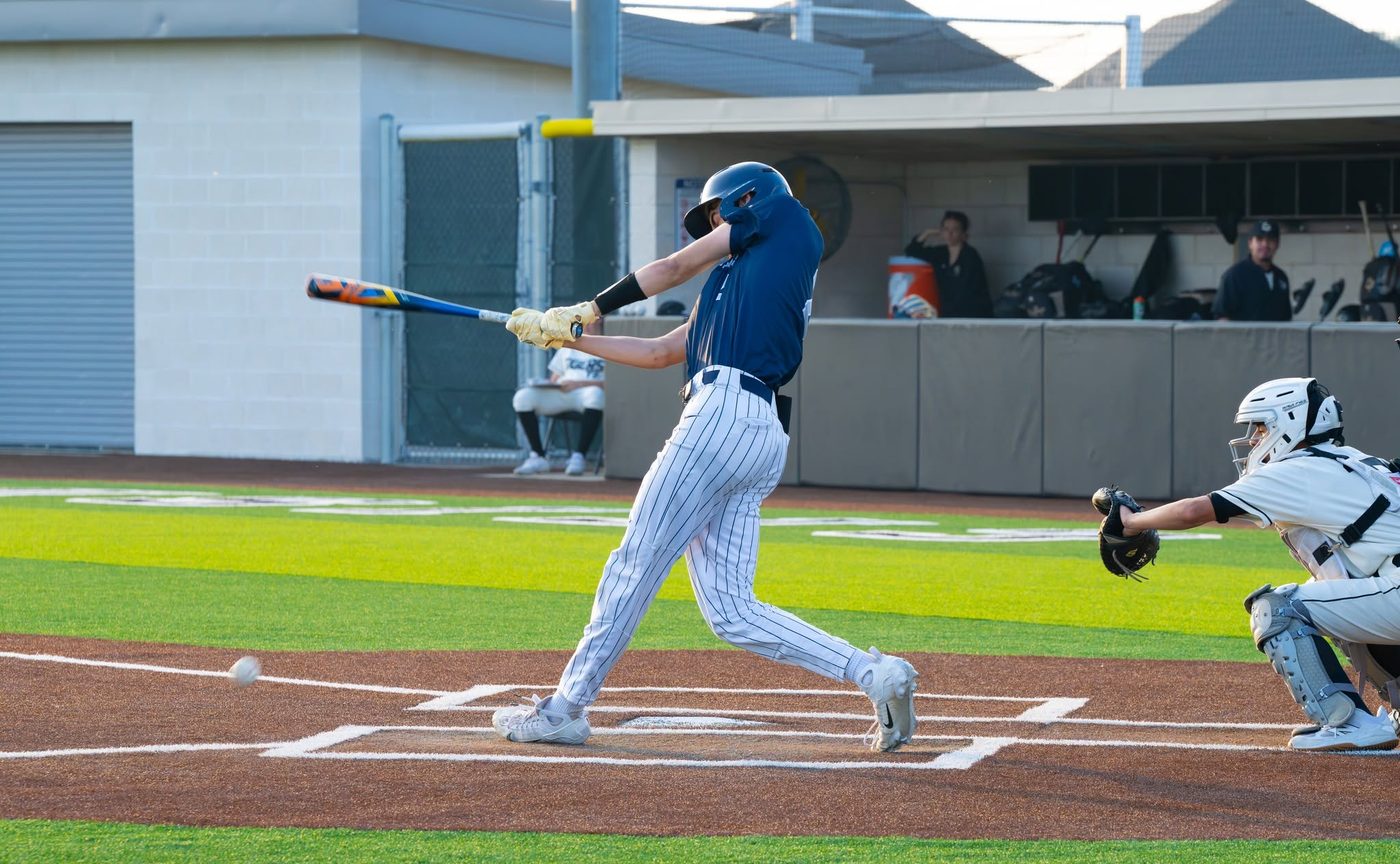 Noah Deason making contact at the plate